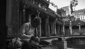 Local man sitting at Angkor Temples, Cambodia